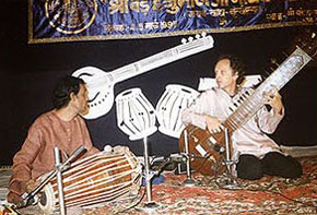 Performing the tarapan with a pakhawaj player at Varanasi music conference in 1994