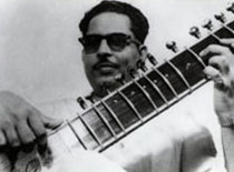 Mushtaq Ali Khan in his prime, playing sitar.
